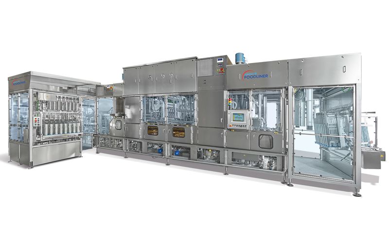 Delivery of the GRUNWALD linear cup filling machine with an innovative peroxide-free ultraclean (UC) hygiene concept